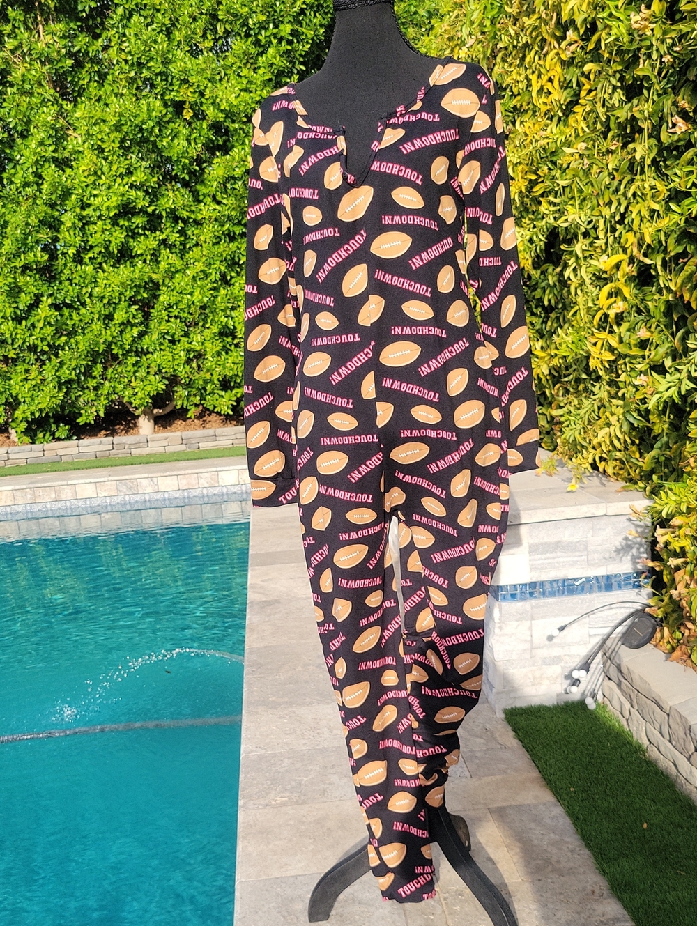 Black Pajama Onesie with Pink Text & Tan Footballs XL